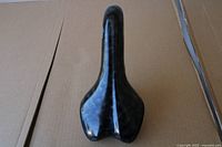 Top view of black carbon-look racing saddle