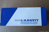 Top view of white and blue U.S. Safety branded box