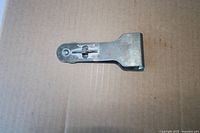 scraper folded position showing head and blade holder