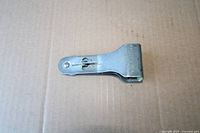 Top view of metal folding scraper closed