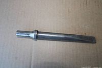 Single steel chisel representative of the seven in lot