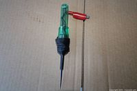 Full view of test light showing probe, handle, and clip