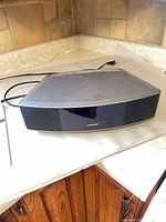 Top view of Bose Wave Radio IV unit with power cord