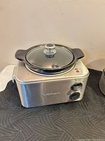 Cuisinart slow cooker, lid and control panel visible