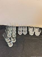 All 17 drinking glasses grouped by size