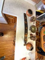 All items arranged on countertop showing overall lot