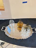 Tray with glassware arranged on top