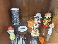 Full lot in cabinet showing all decorative items