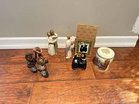 Full lot with figurines, boots, jar, bear figurine, framed picture and box