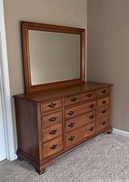 Full view of dresser with mirror attached