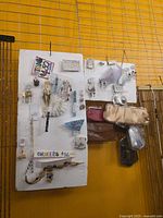 Overall view of jewellery board and handbags