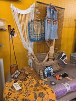 Overview of lot showing curtains, pants, vest, instruments, accessories