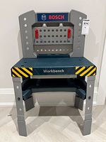 Front view of Bosch plastic kids workbench