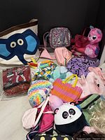 Overview of bags, shoes, plush toy and costume package