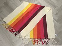 Entire scarf laid flat showing full colour pattern