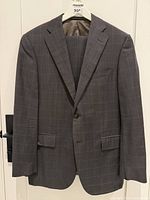 Front view of jacket on hanger showing overall style and pattern