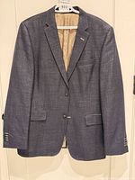 Full view of navy blue sports jacket front