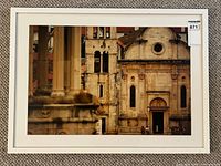 Full view of framed photograph showing entire image and white frame