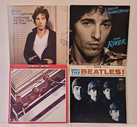 All four album covers arranged together