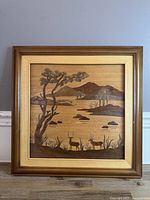 Front view of framed wood inlay art
