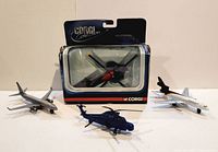 Overall lot with boxed helicopter, blue helicopter, American Airlines tri-jet, NASA 747 Shuttle Carrier