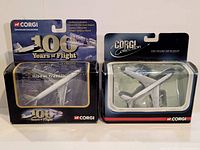 Front view of both boxed Corgi airplanes