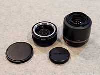 Both lenses with caps displayed front view