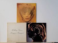 Front covers of three Rolling Stones albums displayed vertically