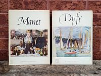 Front view of both art books Manet and Dufy side by side