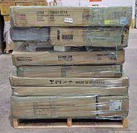 Front view of pallet with six shrink-wrapped cartons; item number 56007-021A and "Made in Denmark" visible