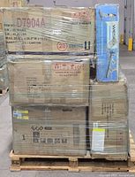 Front view of pallet with Weslo treadmill box and various cartons