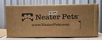 Sealed retail box displaying Neater Pets branding