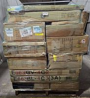 Front view of pallet showing stacked cartons with American Standard branding and Golden Oak label