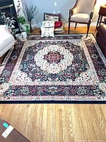 Full view of square area rug laid on hardwood floor