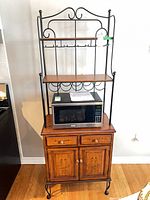 Front view showing entire baker’s rack, upper shelves, wine rack, lower cabinet