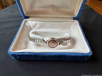 Watch in velvet case, full view