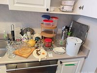 wide view of countertop showing entire lot of kitchenware