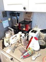 Group of assorted small appliances on countertop