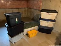All seven Rubbermaid bins stacked together