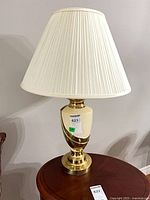 Full view of one lamp showing base and shade