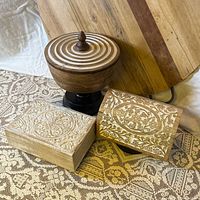 overall view of bowl and two carved boxes