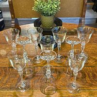 Ten Mikasa Sonata crystal stems arranged on table