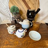 Full group of all pottery items on table