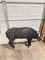 side view of full wild boar decoy showing size and legs