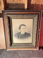 Full view of framed portrait