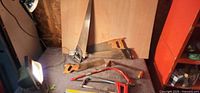 Overall lot showing two panel saws, hacksaw frames, spokeshave and backsaw