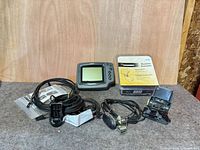 Overall lot with 400TX display, cables, loose transducer, mounting hardware, and packaged XT 9 20 transducer