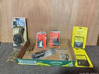 Overall lot showing boxed hunting accessories