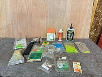 Overall view of all hunting supplies laid out on surface