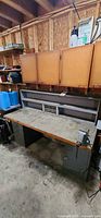 Overall view of workbench with riser shelf, drawer pedestal and vise attached